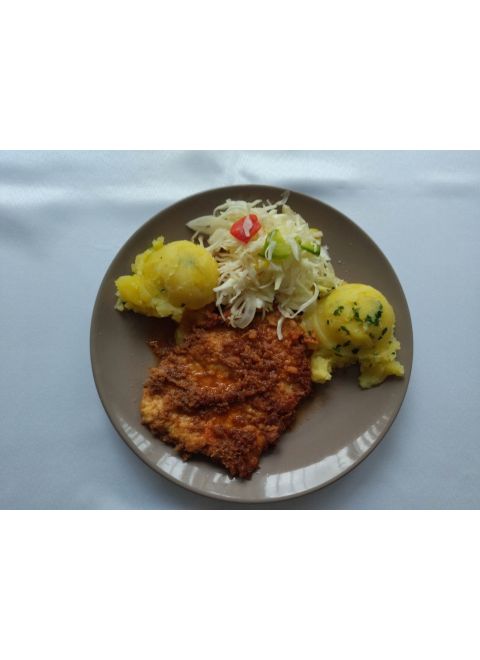 Obratený bravčový rezeň 150g, mastené zemiaky, čalamáda